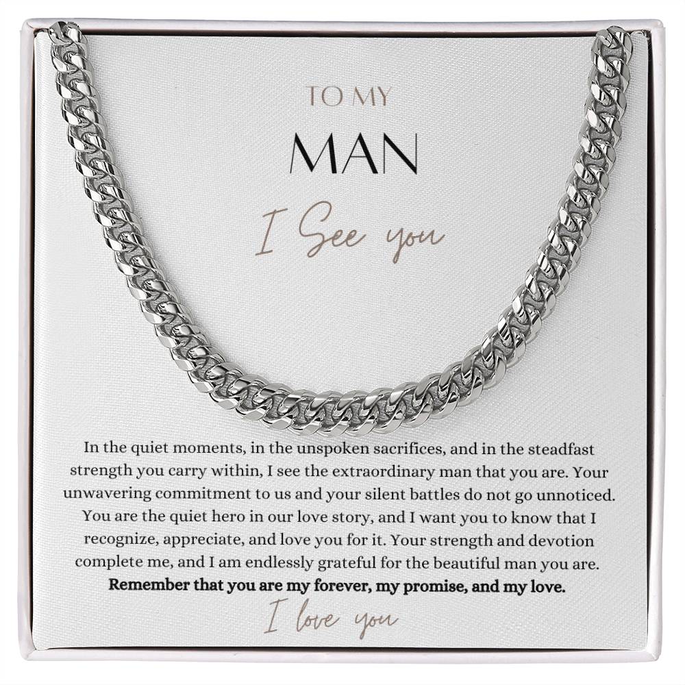 A Cuban chain necklace gift and a white gold finish, with a message card that says to my man, in a Jewelry box.