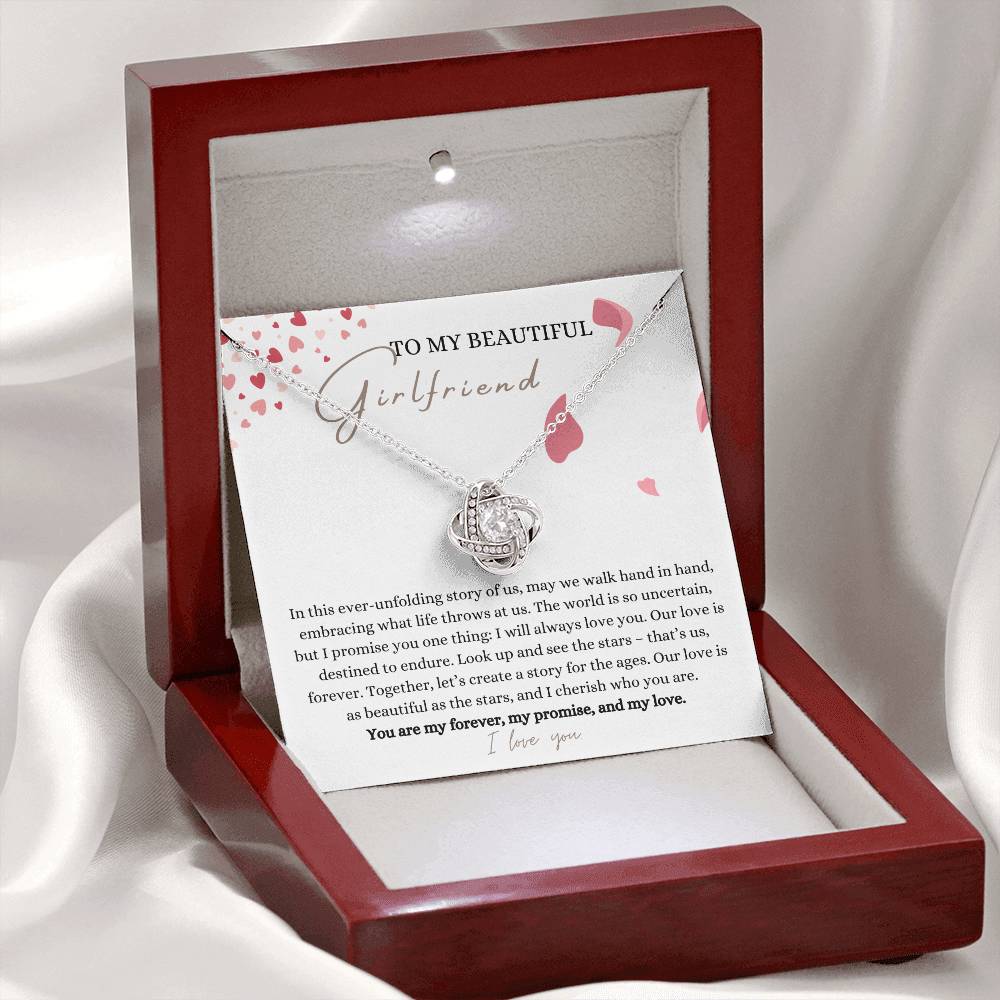 A white gold finish necklace gift, with a knot pendant embellished with premium cubic zirconia crystals, and a message card to my beautiful girlfriend, in a mahogany Jewelry box.