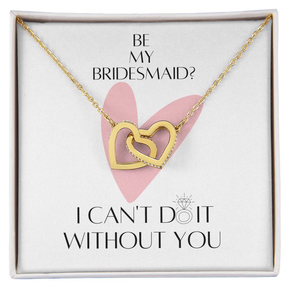 A necklace with two connected hearts embellished with cubic zirconia crystals and  gold finish with a message card for bridesmaids, in a Jewelry gift box.